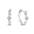 Enchanted Disney Fine Jewelry Sterling Silver with 1 10 CTTW Diamond Elsa Huggie Earrings Online